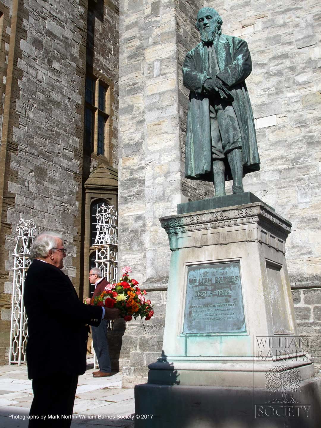 The wreath was laid at the foot of William Barnes statue by David Downton